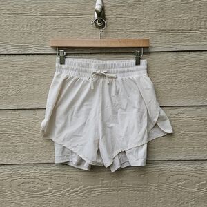 Fabletics ivory Sun Chaser shorts XS